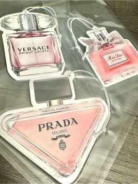 Set of (3) shaped air fresheners featuring stunning designs.